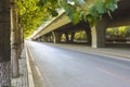 Asphalt roads and city buildings under the overpass, automobile advertising road material.